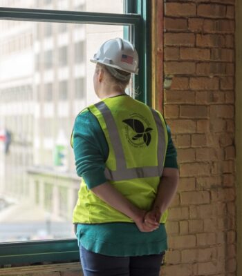 kraemer-design-group-kdg-detroit-elizabeth-window-city-brick-ppe-wear-helmet-vest