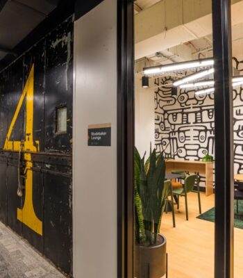 kraemer-design-group-kdg-detroit-411-piquette-flats-4-elevator-lounge-illustrated-wall-plants