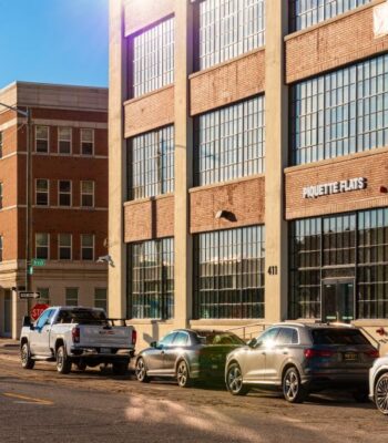 kraemer-design-group-kdg-detroit-411-piquette-flats-exterior-close-up-windows-glare-day