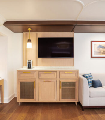 kraemer-design-group-kdg-detroit-athletic-guestroom-renovation-tv--desk-mixed-wood-modern-sofa-cell-header