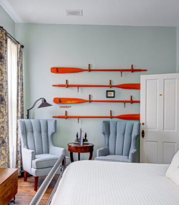 kraemer-design-group-kdg-detroit-birch-lodge-trout-lake-interior-red-orange-starcraft-boat-paddle-bed-bedroom-room-light-blue-header