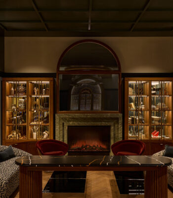 kraemer-design-group-kdg-detroit-dearborn-inn-interior-hotel-hospitality-lounge-fireplace-display-case-jewel-tone-header