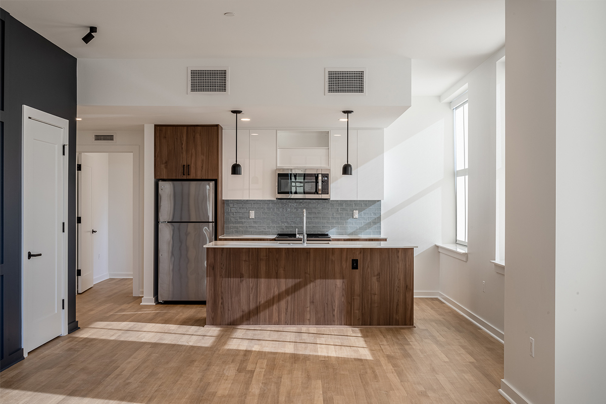 Historic Free Press building transformed into apartments with robot valet parking, rooftop pool