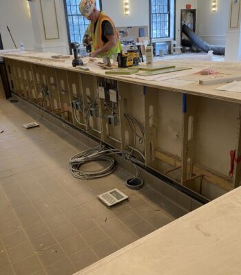kraemer-design-group-kdg-detroit-interior-construction-dearborn-inn-worker-countertop