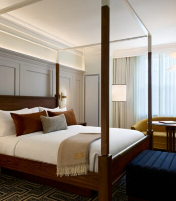 kraemer-design-group-kdg-detroit-kraemer-design-group-kdg-detroit-dearborn-inn-interior-bedroom-velvet-ottoman-bed-issac-maiselman