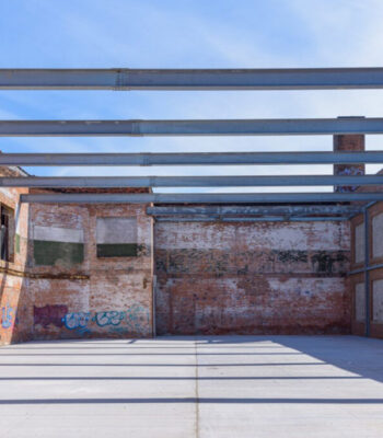 kraemer-design-group-kdg-dreamtroit-detroit-1331-holden-structural-beams-silver-lot-daytime-exterior-header